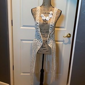 Cream sleeveless cardigan , necklace not for sale